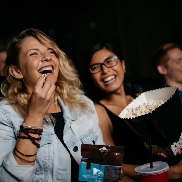 Student Cinema Goes Enjoying a Film
